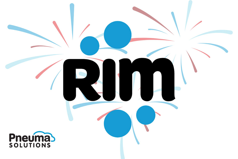 The RIM logo has the letters RIM surrounded by four blue circles representing remote target machines. Red and blue fireworks can be seen in the background, along with the Pneuma Solutions logo in the bottom left.